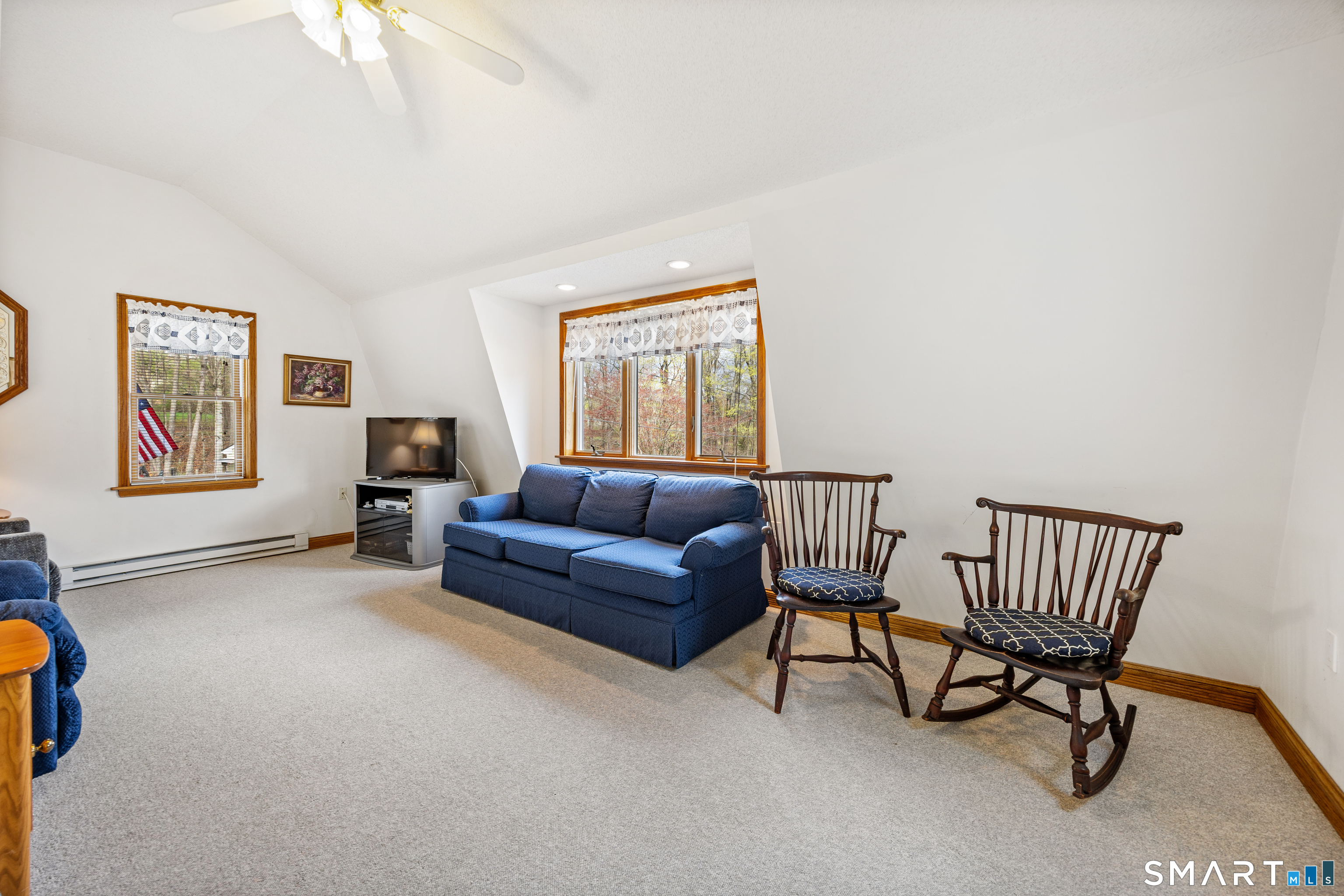 42 Chimney Sweep Road Wallingford, CT 06492 - Photo 34 of 40 a living room with furniture and a window