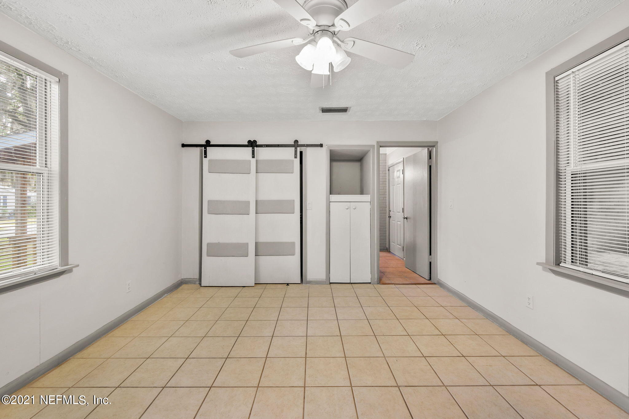 416 Aiken Road Jacksonville, FL 32216 - Photo 17 of 30 barn door and storage