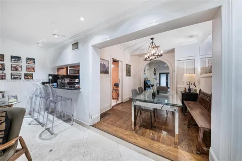 a view of a living room and dining room