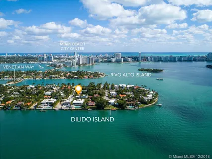 a view of a lake with a big yard