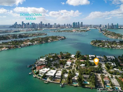 a terrace with a lake view and houses with outdoor space