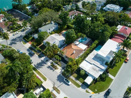 an aerial view of a house with a garden