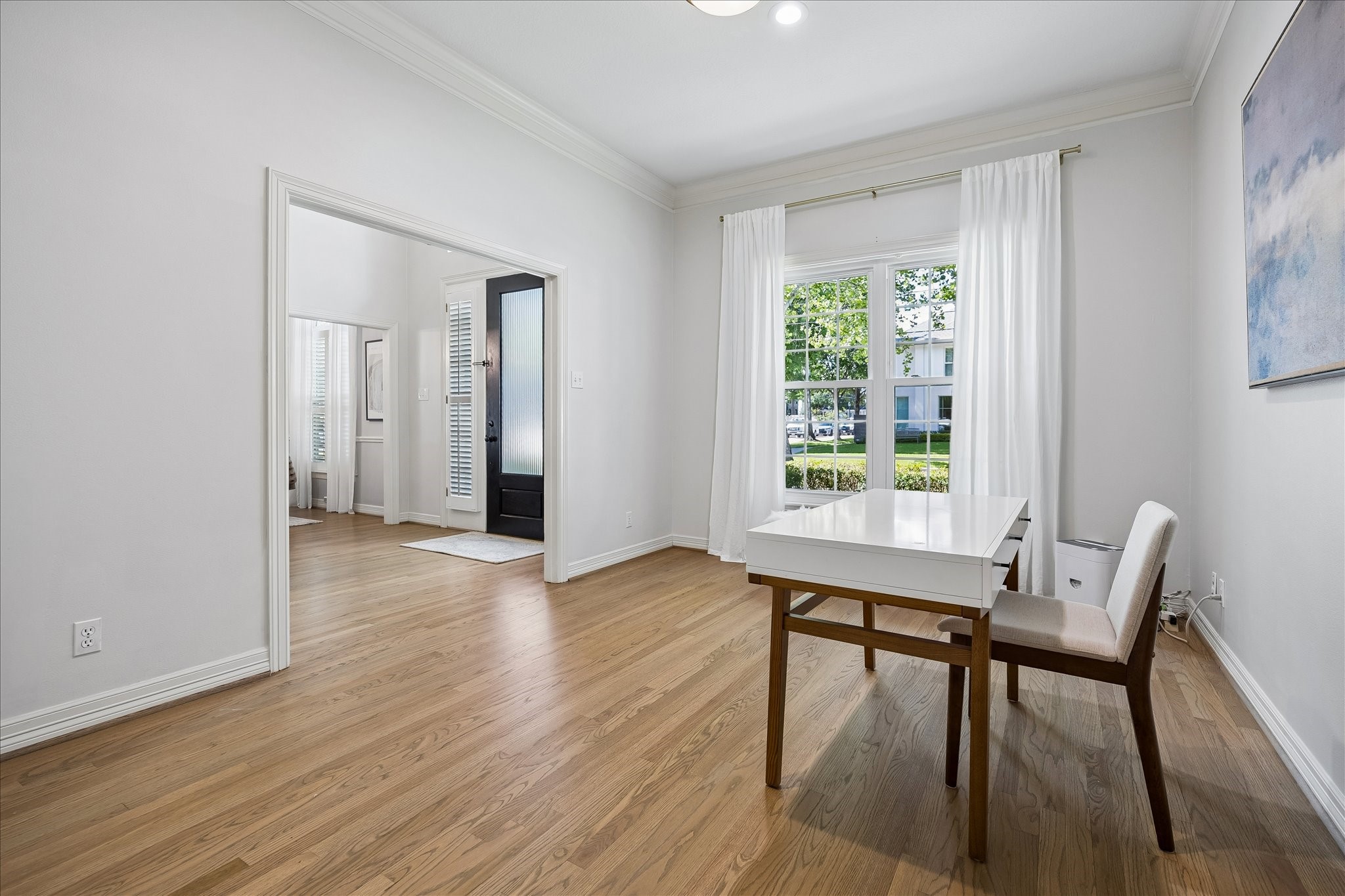 4131 Sunset Boulevard Houston, TX 77005 - Photo 6 of 38 a view of a room with wooden floor lounge chair and windows