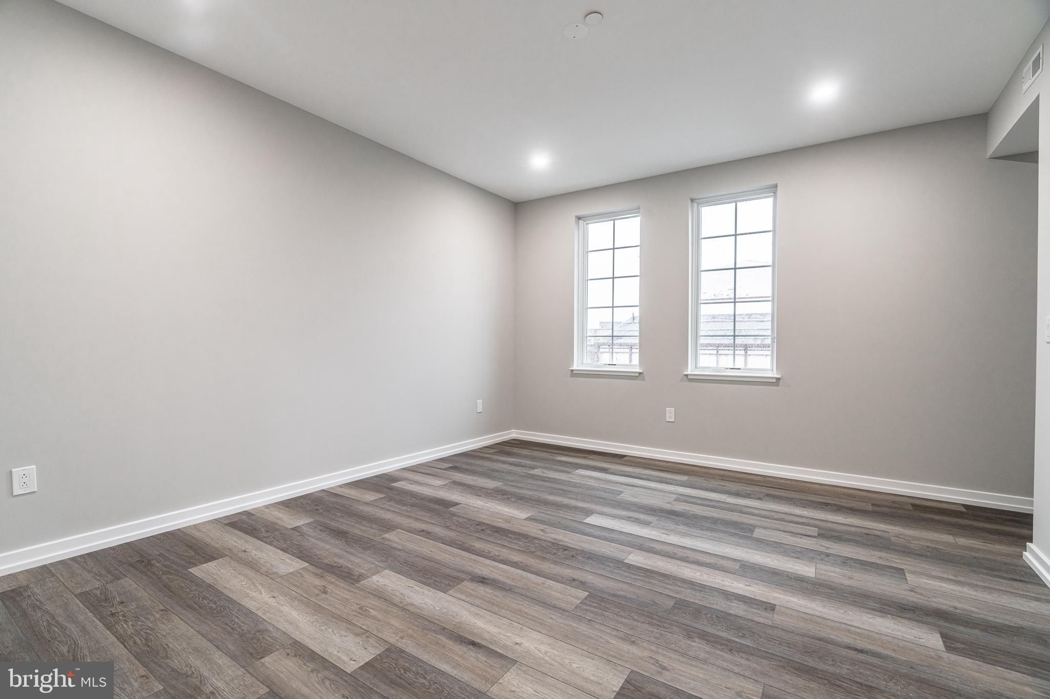 2412 Innovator Way, Unit 3 Philadelphia, PA 19146 - Photo 18 of 25 wooden floor in an empty room with a window