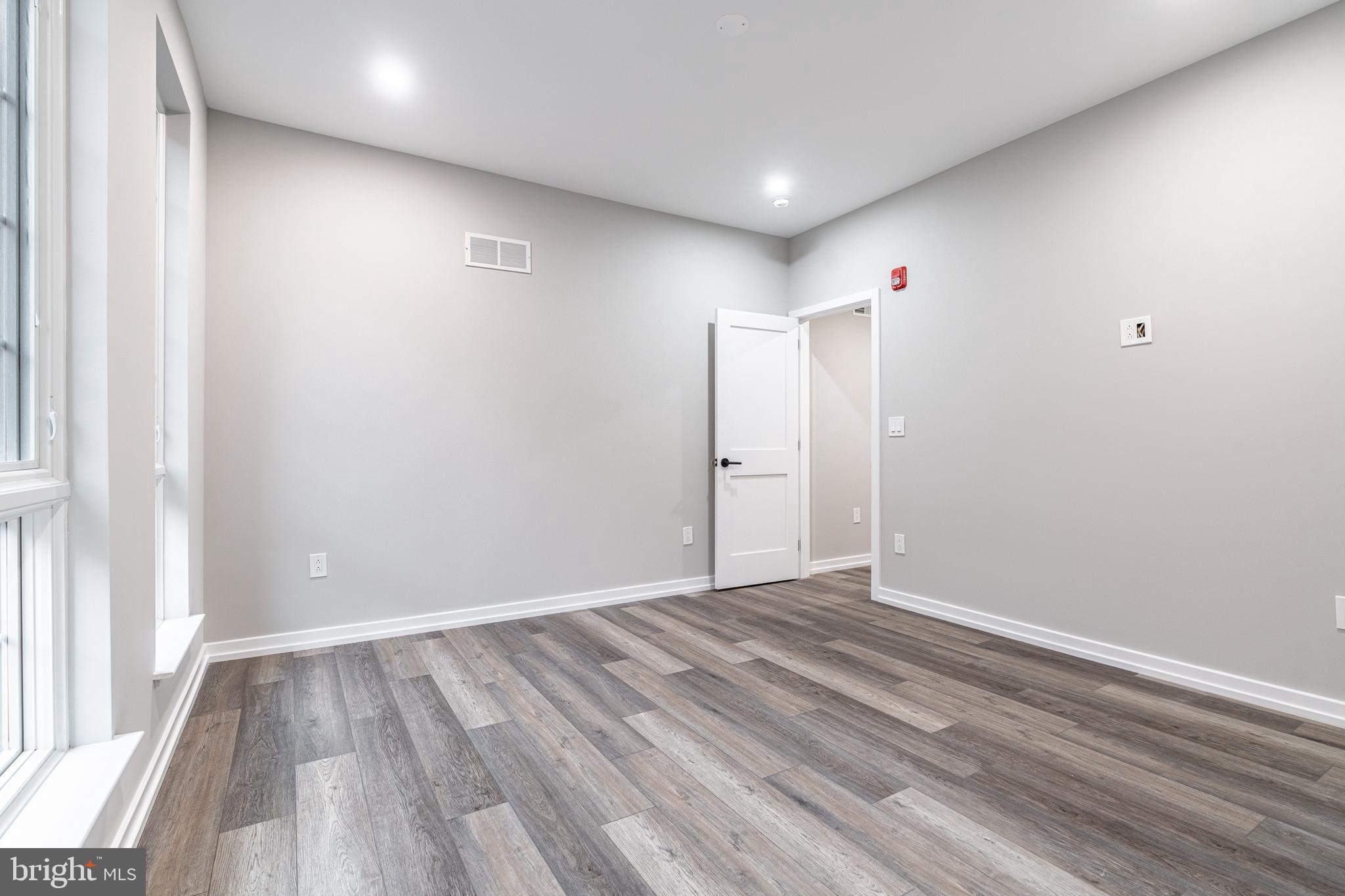 2412 Innovator Way, Unit 3 Philadelphia, PA 19146 - Photo 20 of 25 a view of an empty room with wooden floor