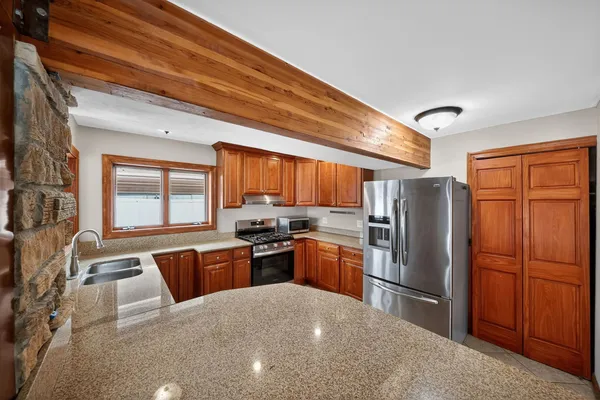 a kitchen with a sink and cabinets