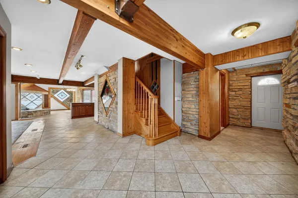 a view of an entryway with a door