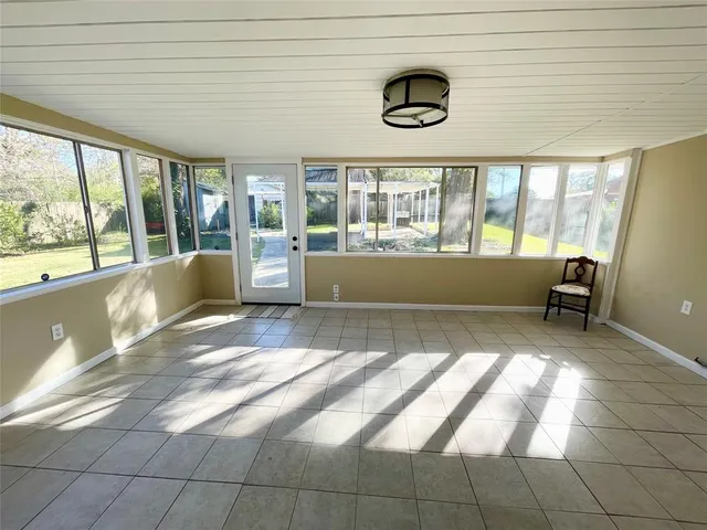 a view of an empty room and window
