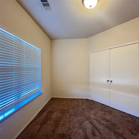 a view of a room with an empty space