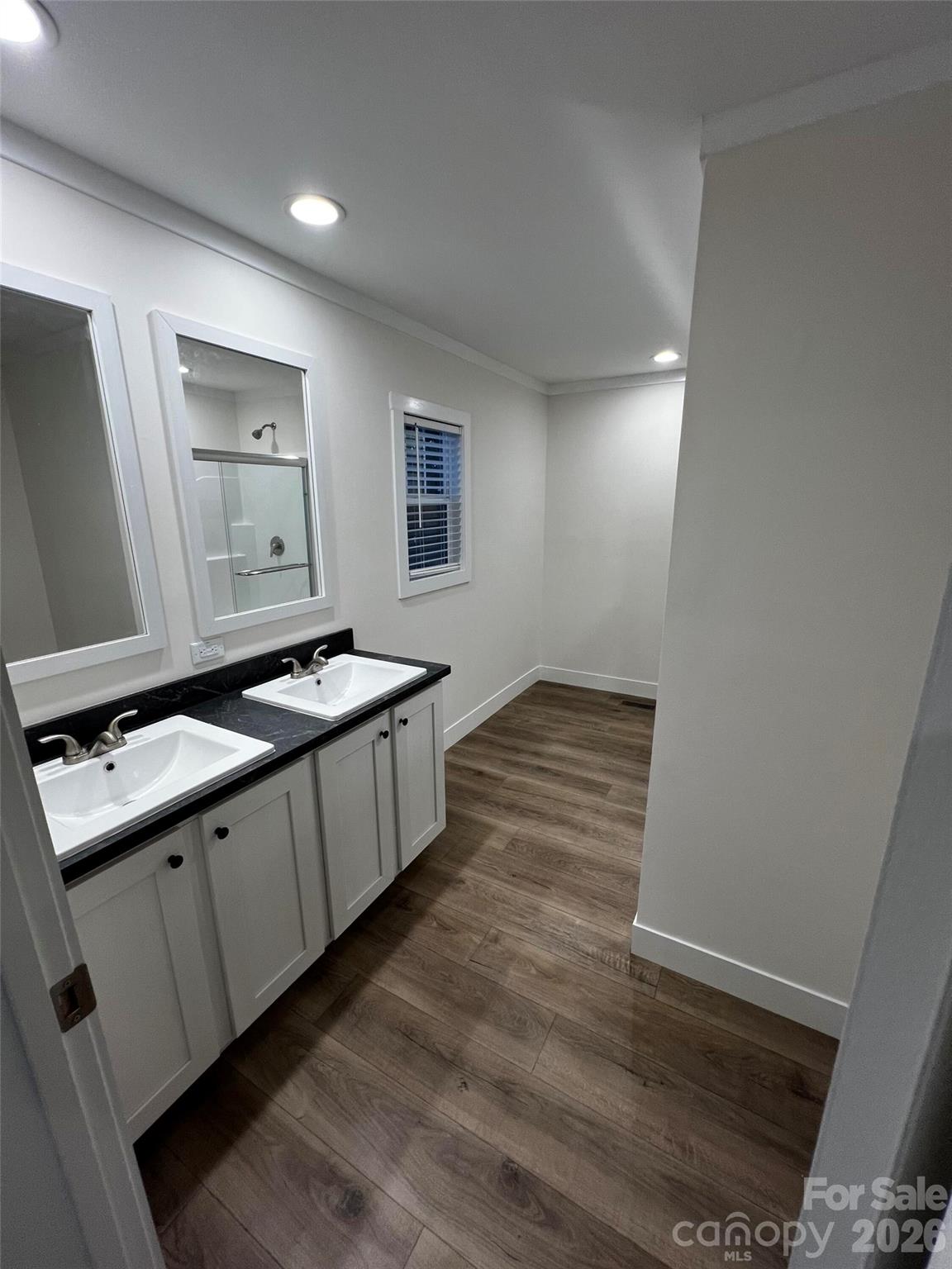 111 Overcash Road Troutman, NC 28166 - Photo 11 of 19 a kitchen with a sink and a stove top oven