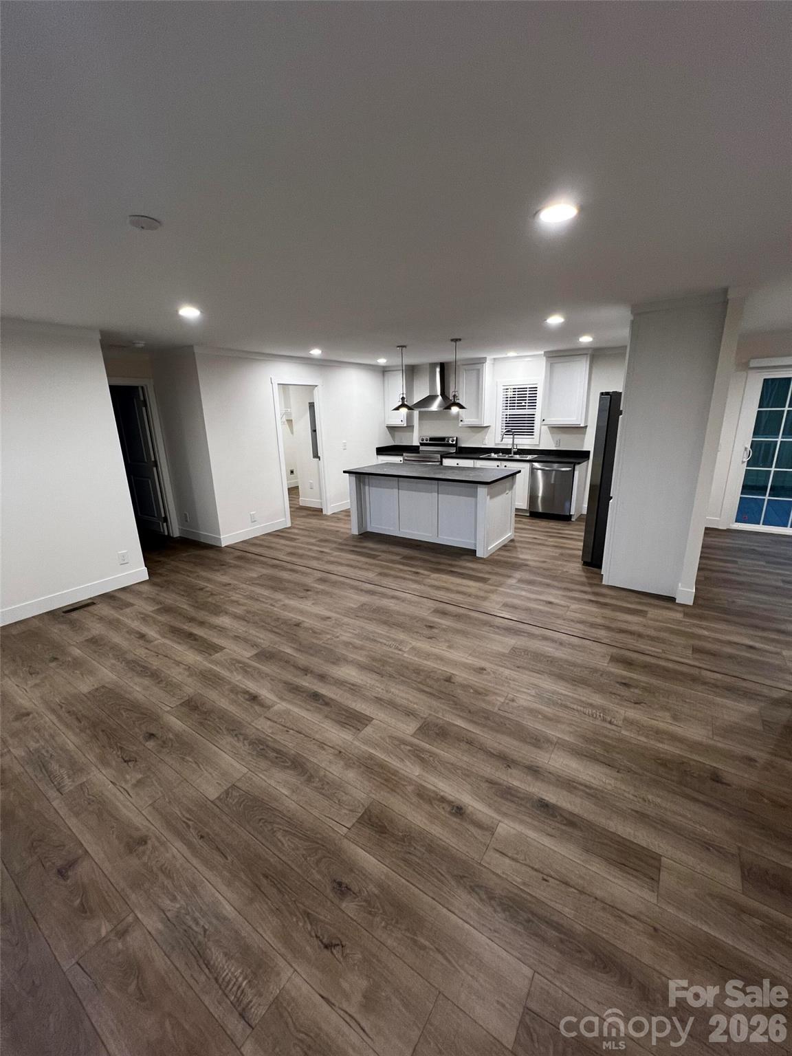 111 Overcash Road Troutman, NC 28166 - Photo 6 of 19 a kitchen with kitchen island counter top space