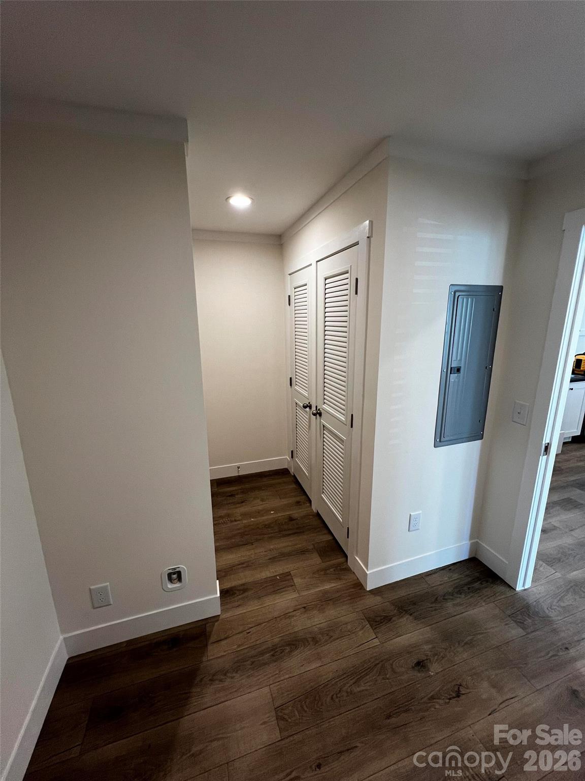 111 Overcash Road Troutman, NC 28166 - Photo 8 of 19 a view of an empty room with wooden floor and a window