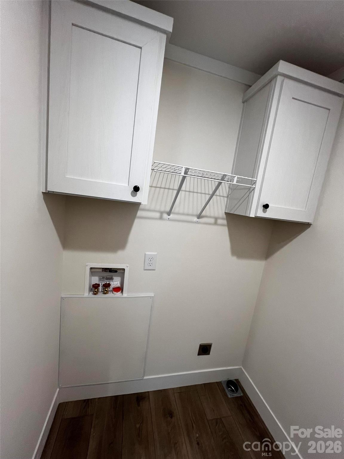 111 Overcash Road Troutman, NC 28166 - Photo 9 of 19 a view of storage and utility room with wooden floor