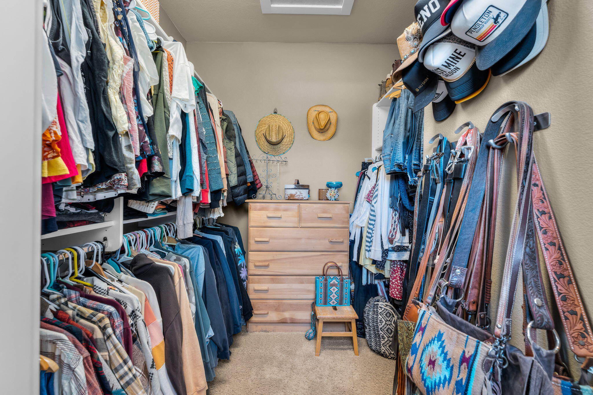 10875 Southwest Mintken Lane Culver, OR 97734 - Photo 15 of 43 a view of walk in closet with clothes and shoes
