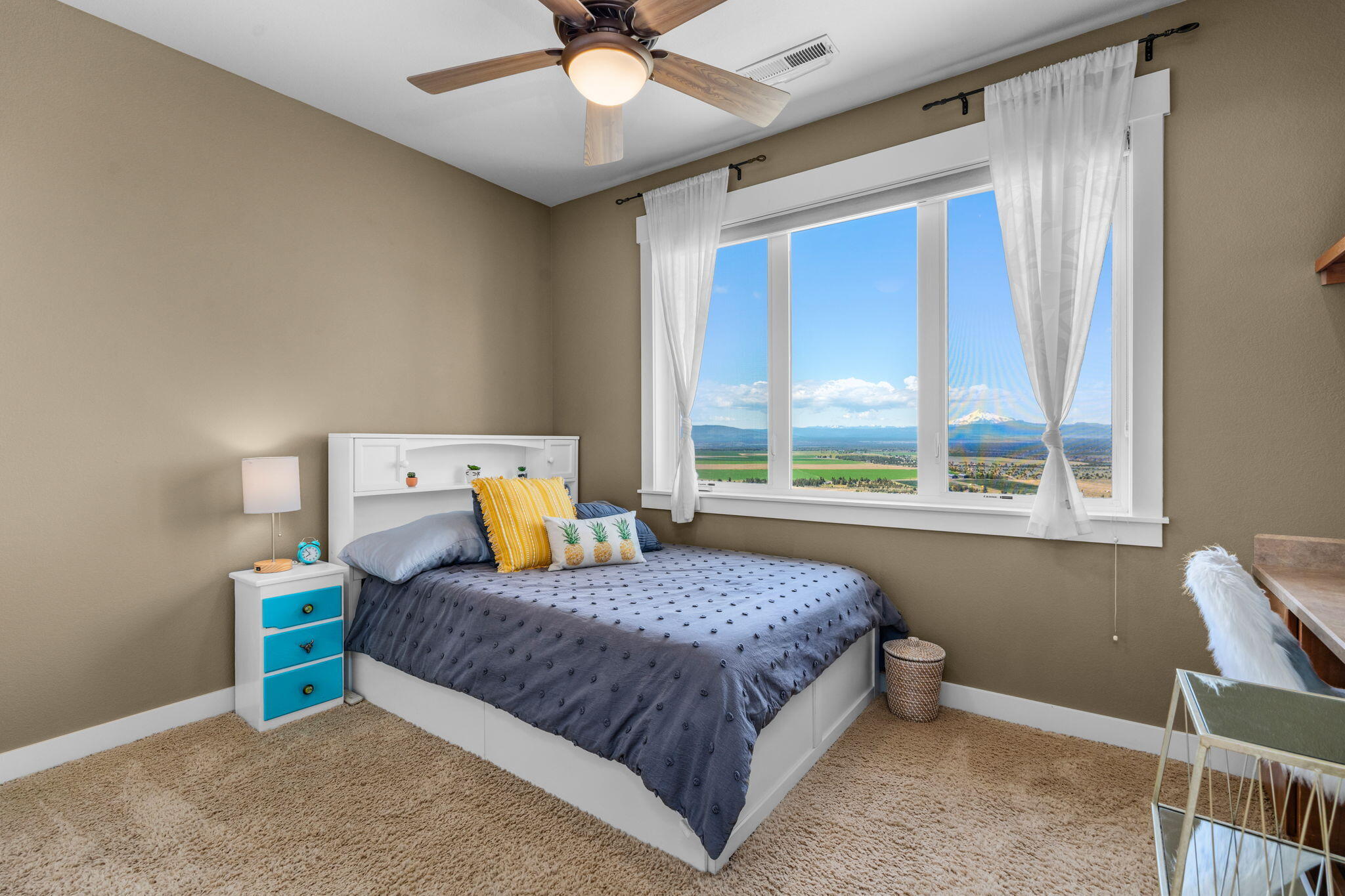 10875 Southwest Mintken Lane Culver, OR 97734 - Photo 16 of 43 a bedroom with a bed and window