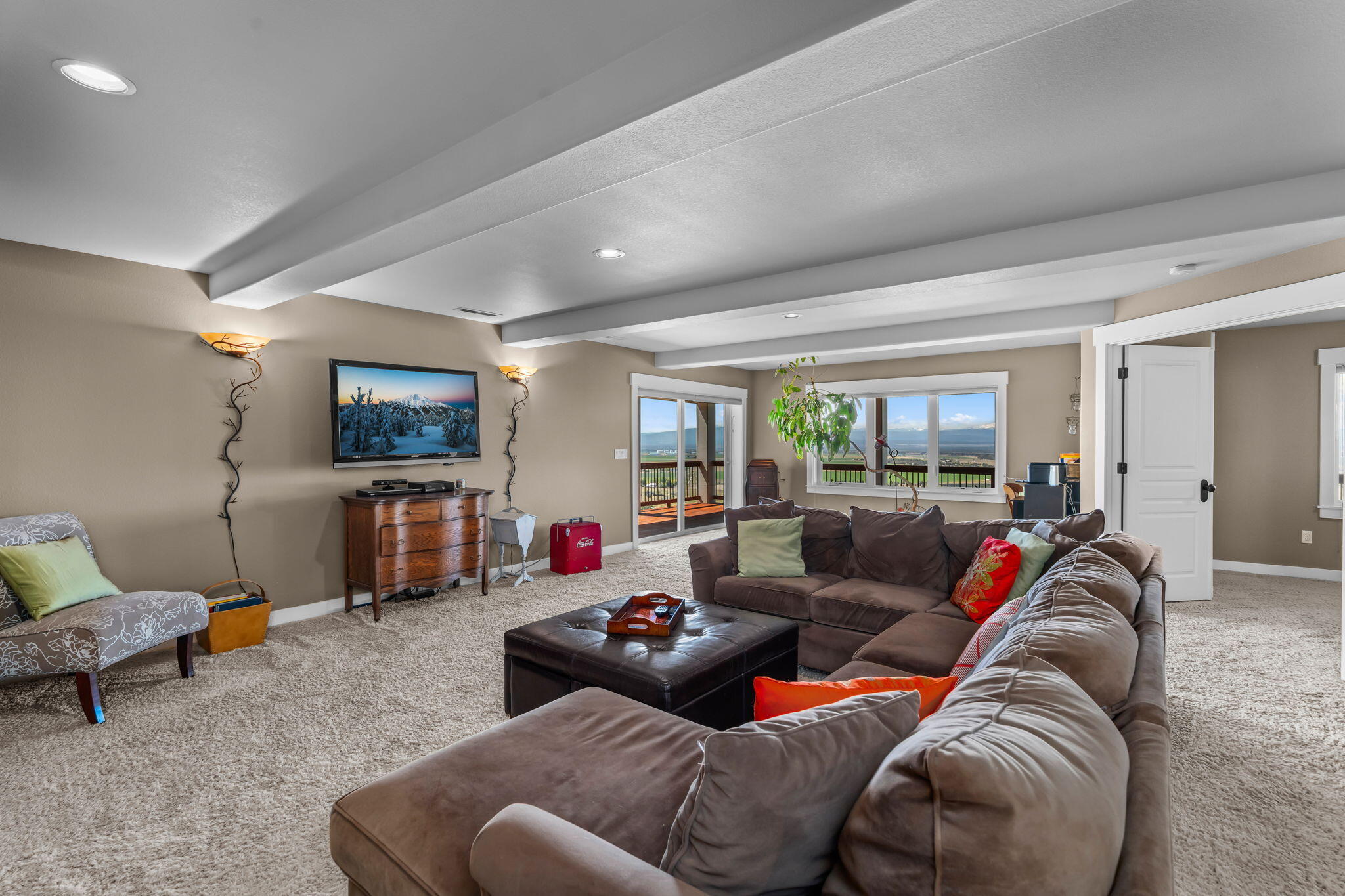 10875 Southwest Mintken Lane Culver, OR 97734 - Photo 20 of 43 a living room with furniture and a flat screen tv