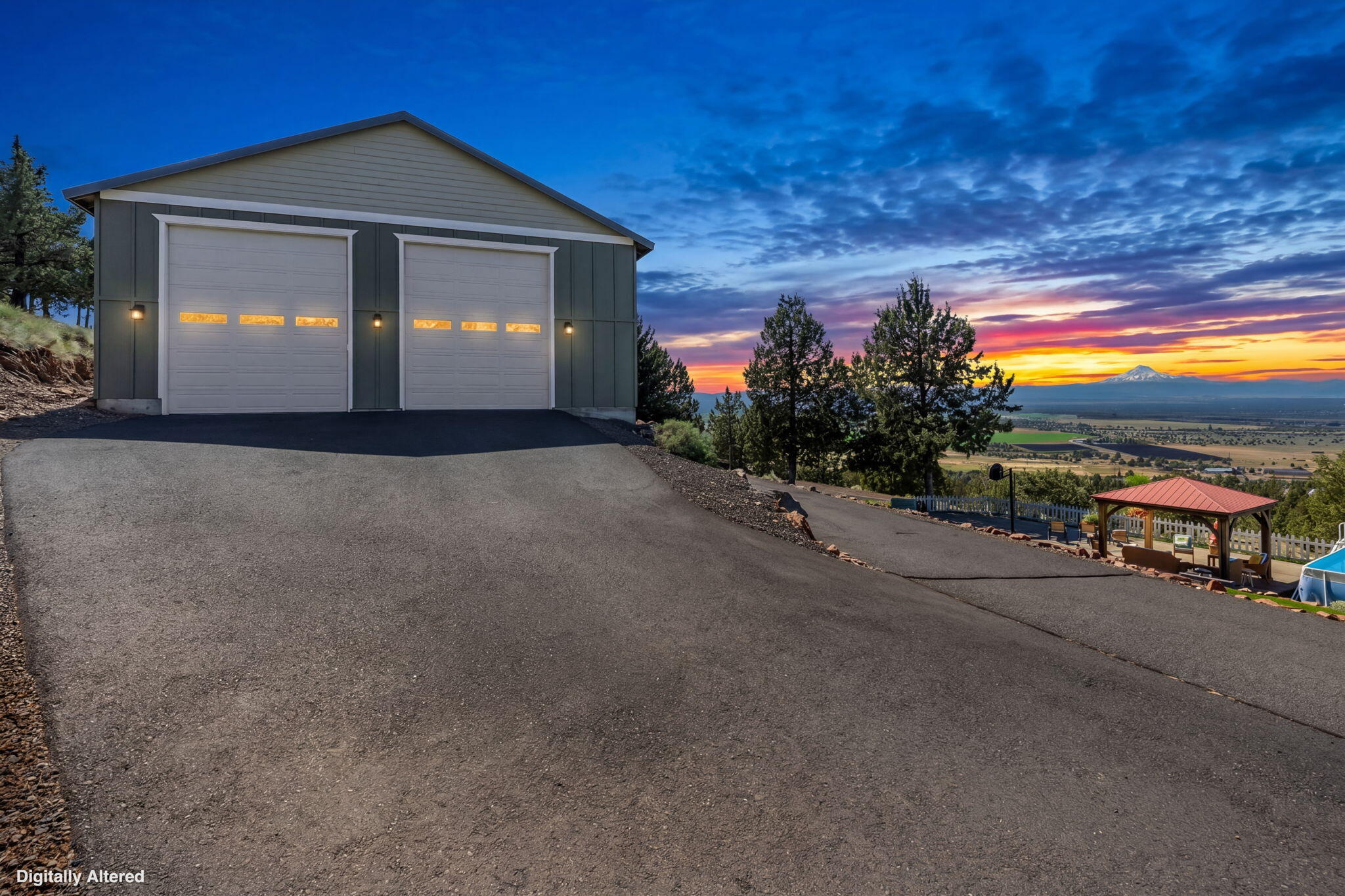 10875 Southwest Mintken Lane Culver, OR 97734 - Photo 26 of 43 a front view of a house with a yard and a garage