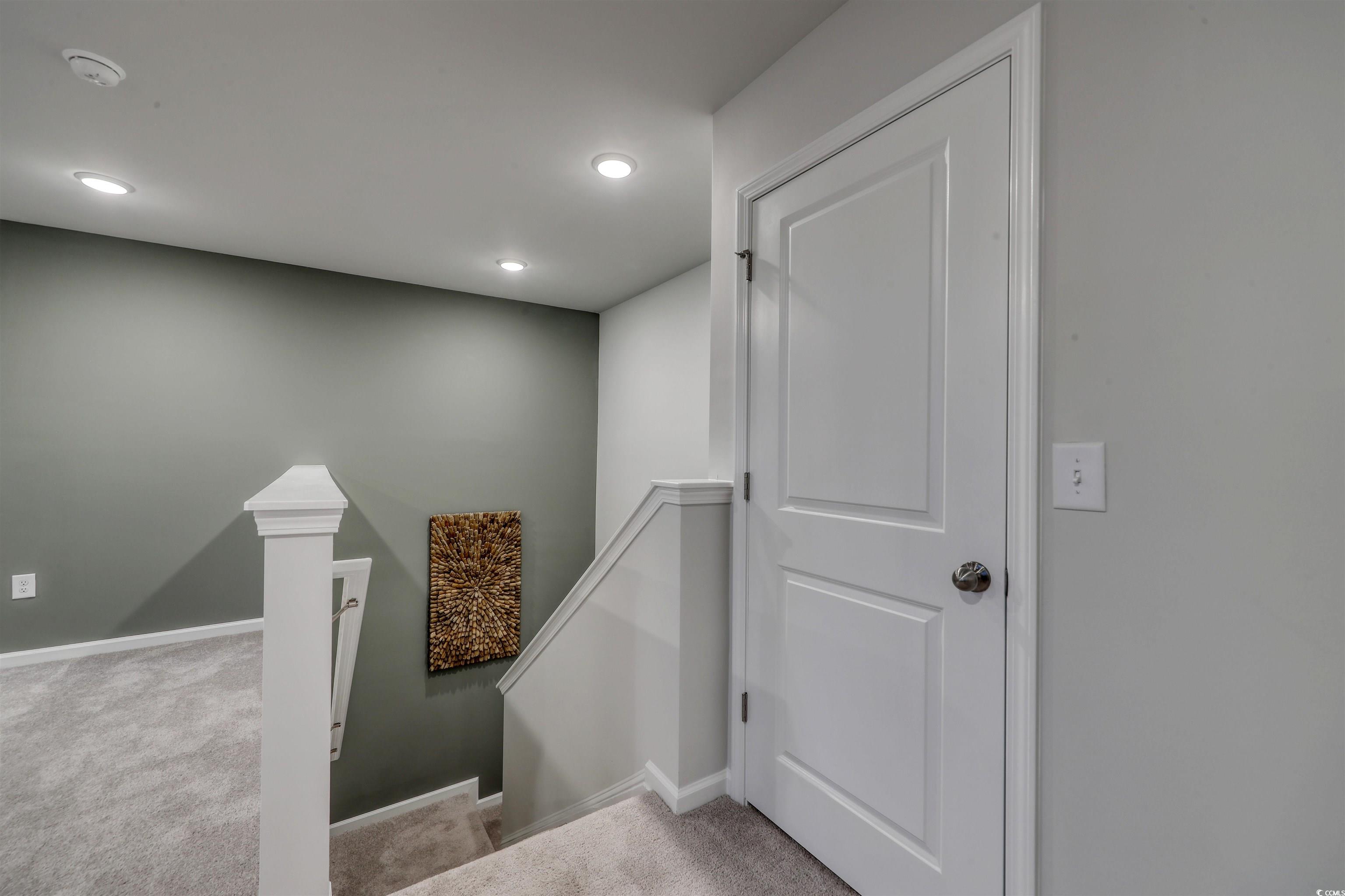 3090 Visionary Drive Myrtle Beach, SC 29588 - Photo 17 of 28 Staircase featuring carpet flooring and recessed lighting