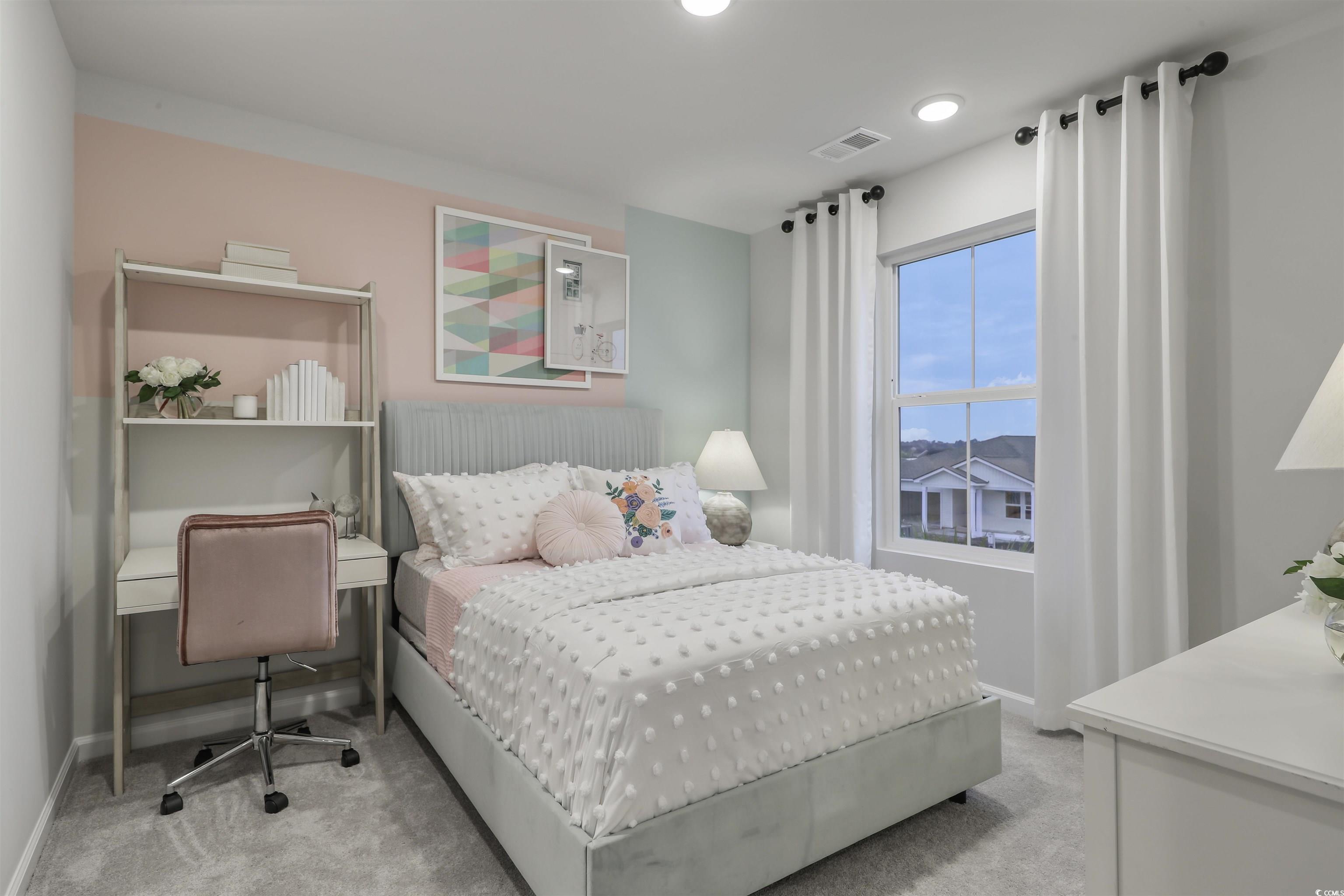 3090 Visionary Drive Myrtle Beach, SC 29588 - Photo 22 of 28 Bedroom with light colored carpet and baseboards