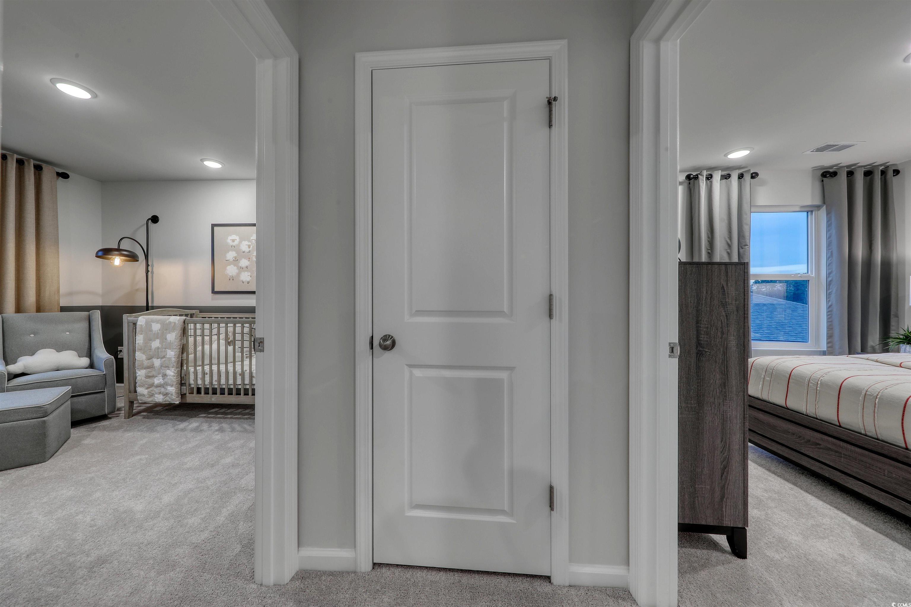 3090 Visionary Drive Myrtle Beach, SC 29588 - Photo 23 of 28 Hall featuring light colored carpet and recessed lighting