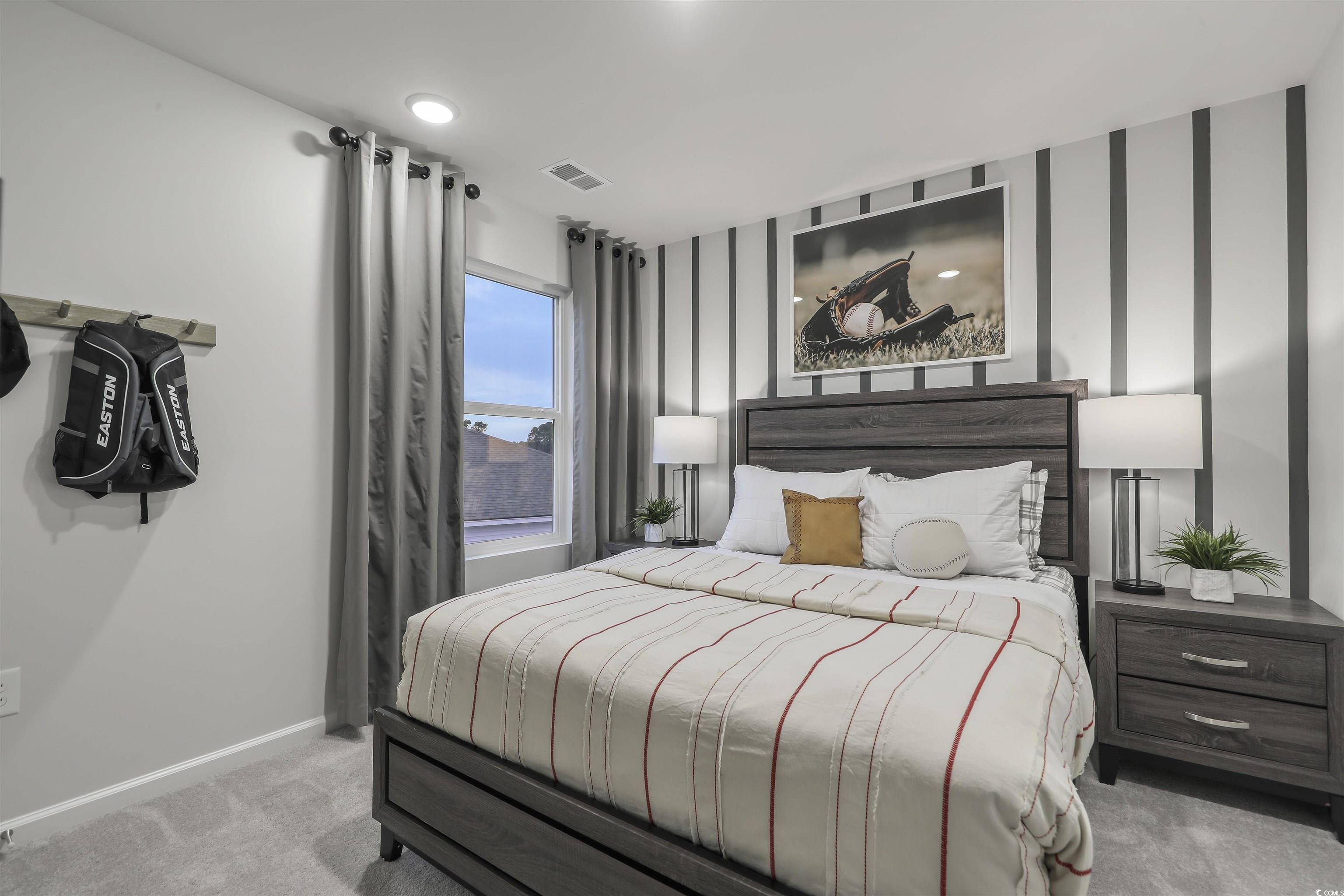 3090 Visionary Drive Myrtle Beach, SC 29588 - Photo 25 of 28 Bedroom with light carpet and baseboards