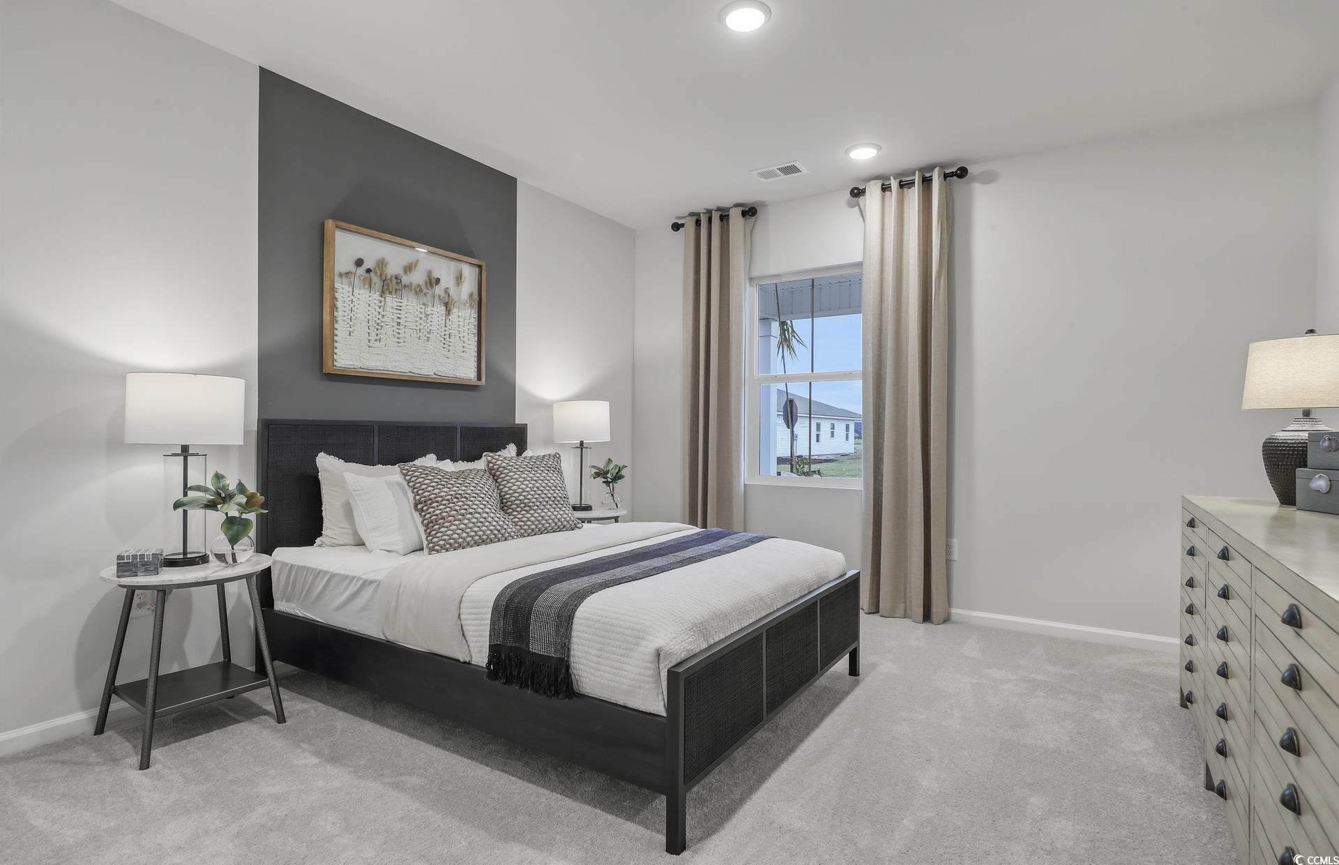 3090 Visionary Drive Myrtle Beach, SC 29588 - Photo 5 of 28 Bedroom with light colored carpet and recessed lighting