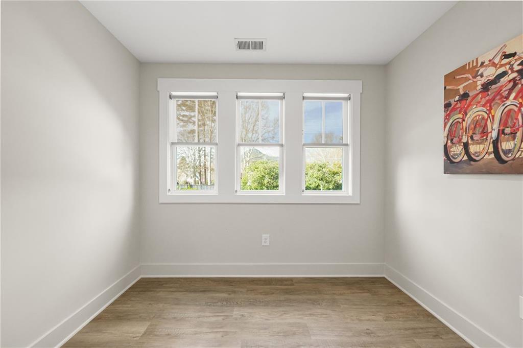 265 Holland Road Powder Springs, GA 30127 - Photo 20 of 27 an empty room with windows