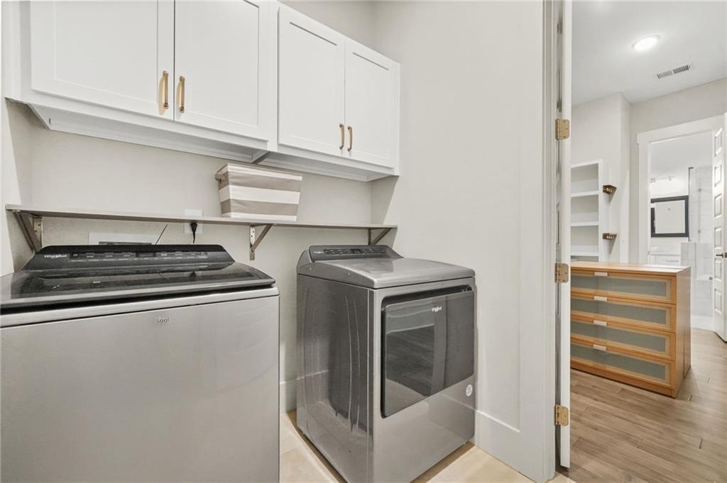 265 Holland Road Powder Springs, GA 30127 - Photo 21 of 27 a close view of a stove and cabinets