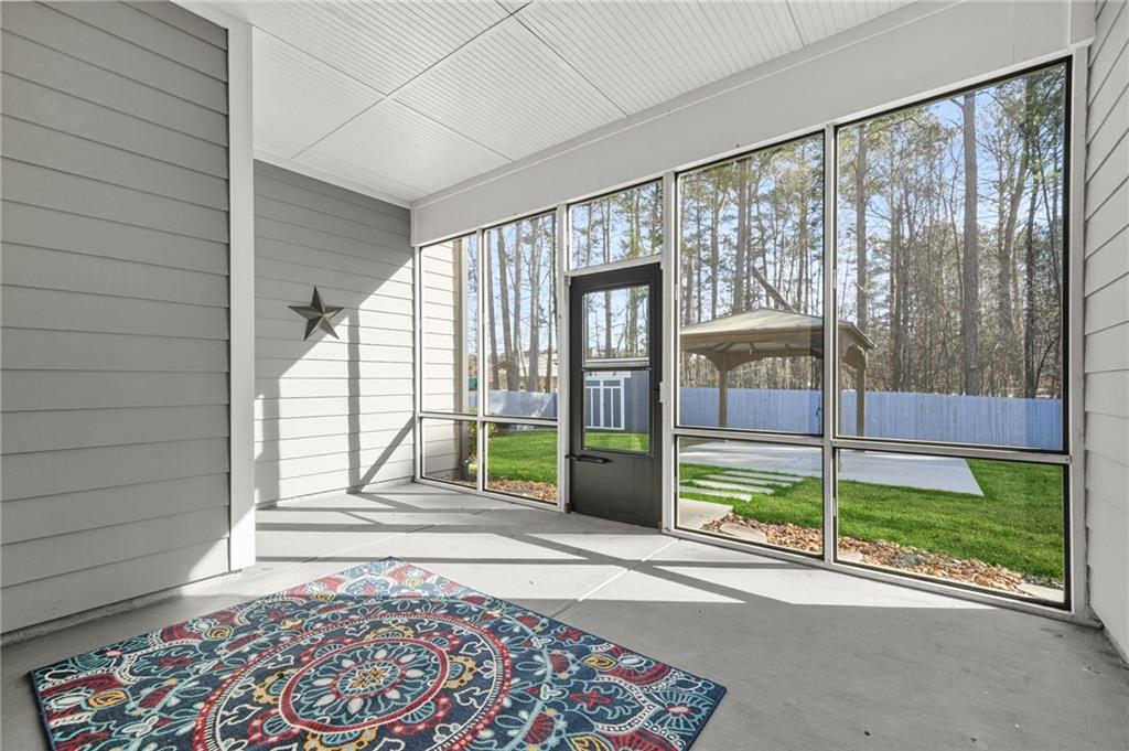 265 Holland Road Powder Springs, GA 30127 - Photo 23 of 27 a house view with a garden space