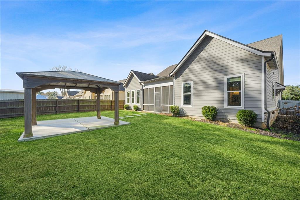 265 Holland Road Powder Springs, GA 30127 - Photo 25 of 27 a view of a house with a yard