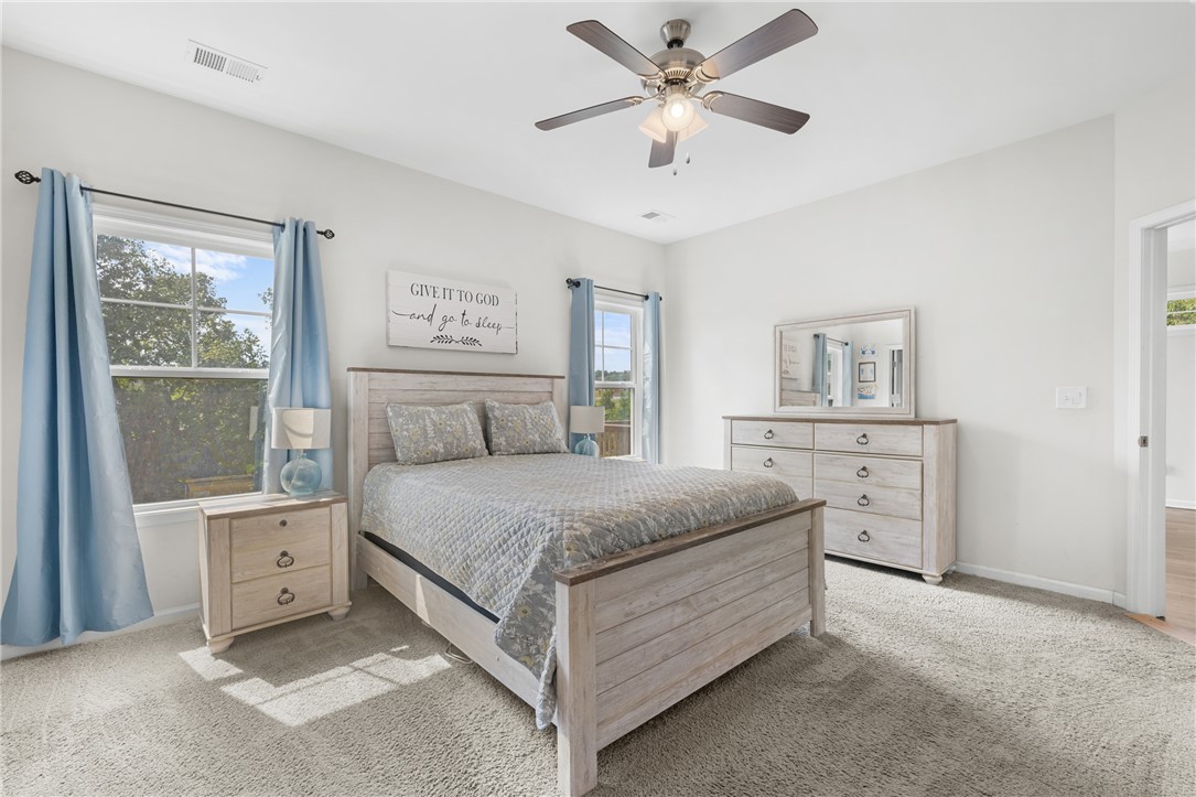 768 Rocky Ridge Circle Seneca, SC 29678 - Photo 4 of 30 Well-lit and tranquil, this bedroom provides a serene retreat.