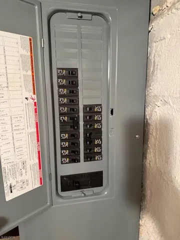 a bathroom with a shower and a window