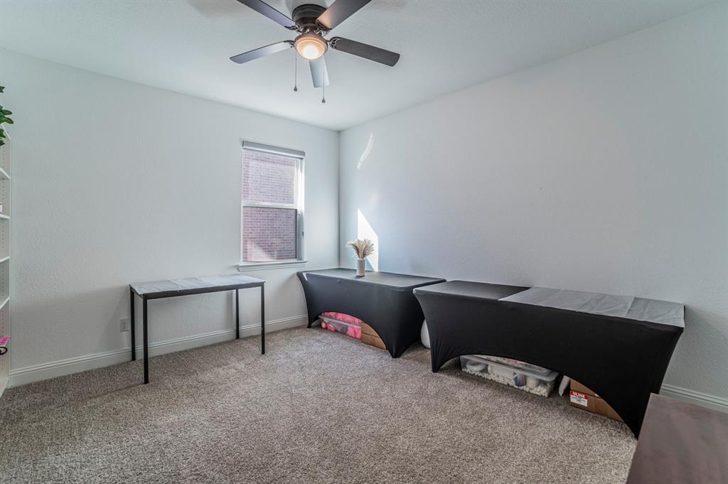 2519 Bedford Road Northlake, TX 76226 - Photo 17 of 33 a bedroom with a bed and a window