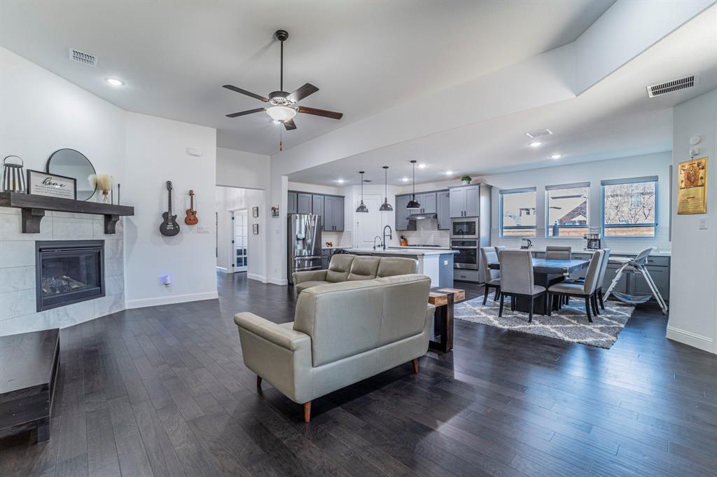 2519 Bedford Road Northlake, TX 76226 - Photo 2 of 33 a living room with furniture and kitchen view