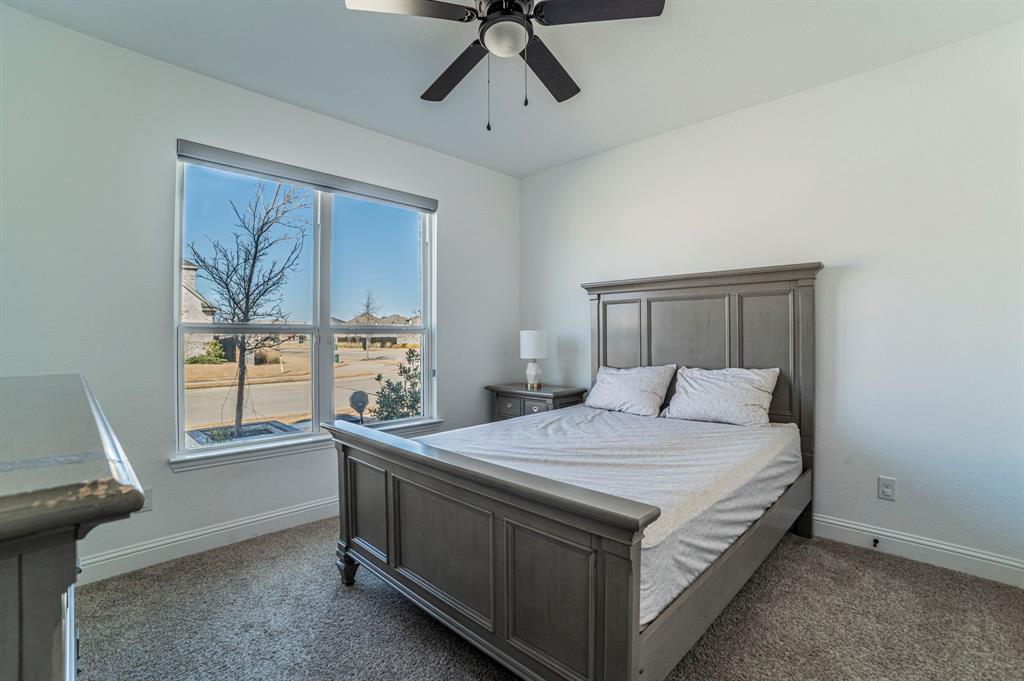 2519 Bedford Road Northlake, TX 76226 - Photo 26 of 33 a bedroom with a bed and a window