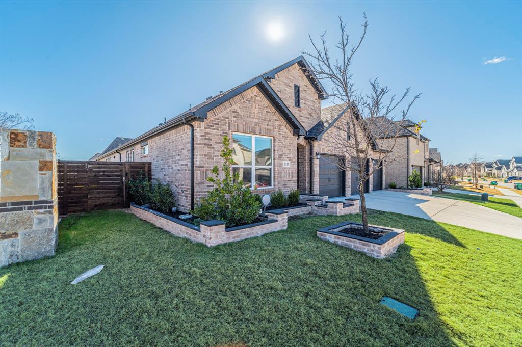 2519 Bedford Road Northlake, TX 76226 - Photo 28 of 33 a view of a house with backyard and porch