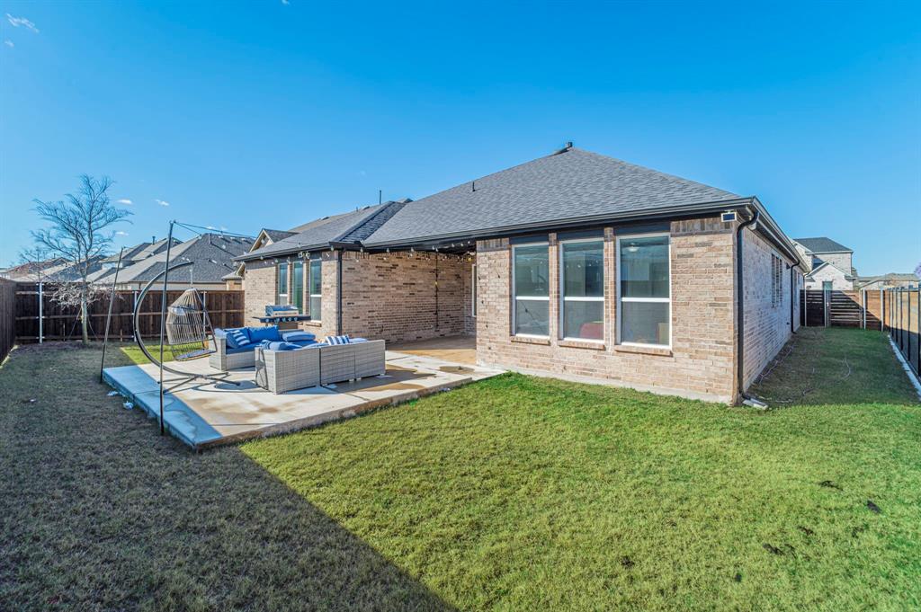 2519 Bedford Road Northlake, TX 76226 - Photo 30 of 33 a view of a house with a yard and sitting area