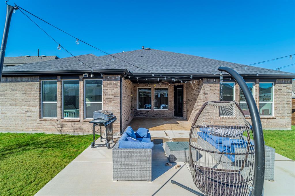 2519 Bedford Road Northlake, TX 76226 - Photo 31 of 33 a front view of a house with a garden and porch