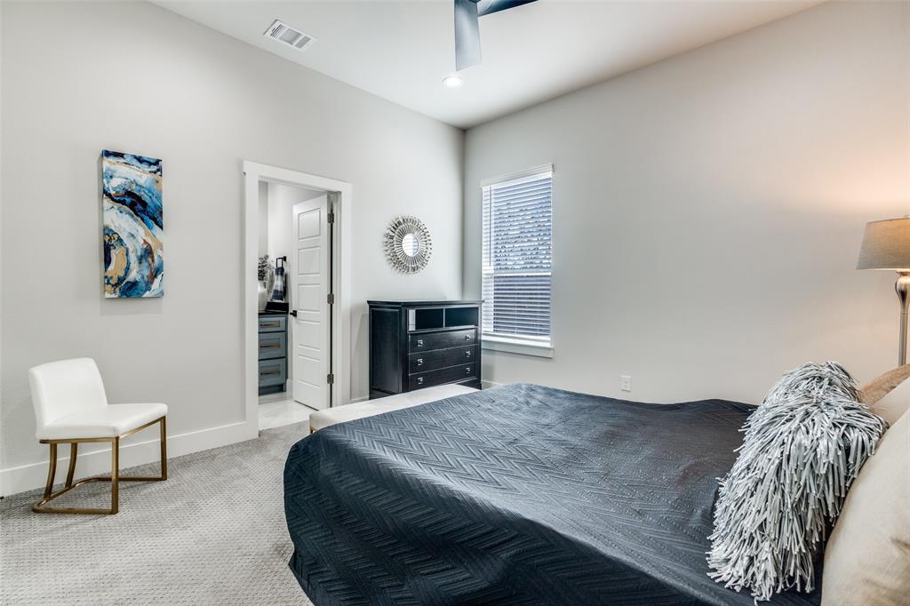518 Crete Street Dallas, TX 75203 - Photo 14 of 27 Carpeted upstairs bedroom featuring recessed lighting