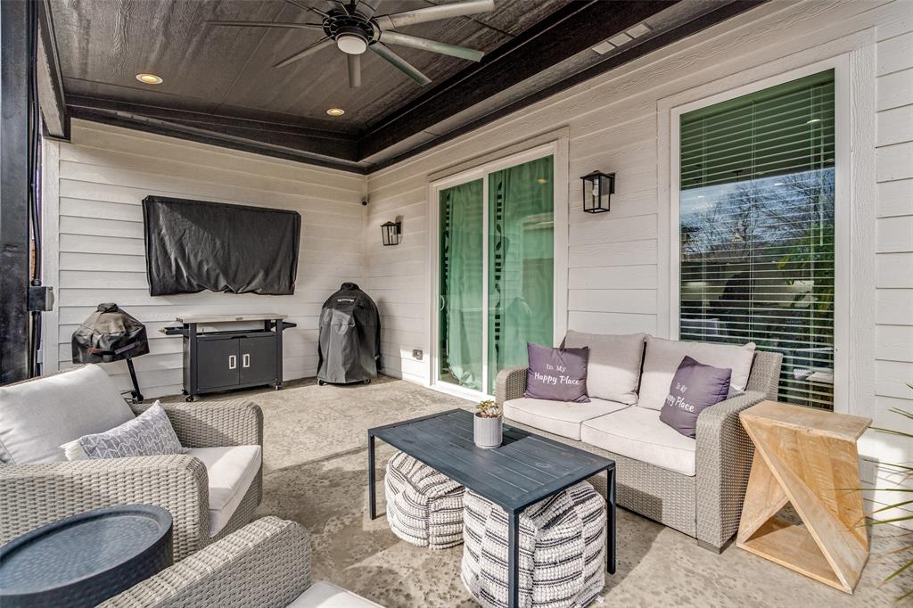 518 Crete Street Dallas, TX 75203 - Photo 23 of 27 View of covered patio with a firepit area and a ceiling fan