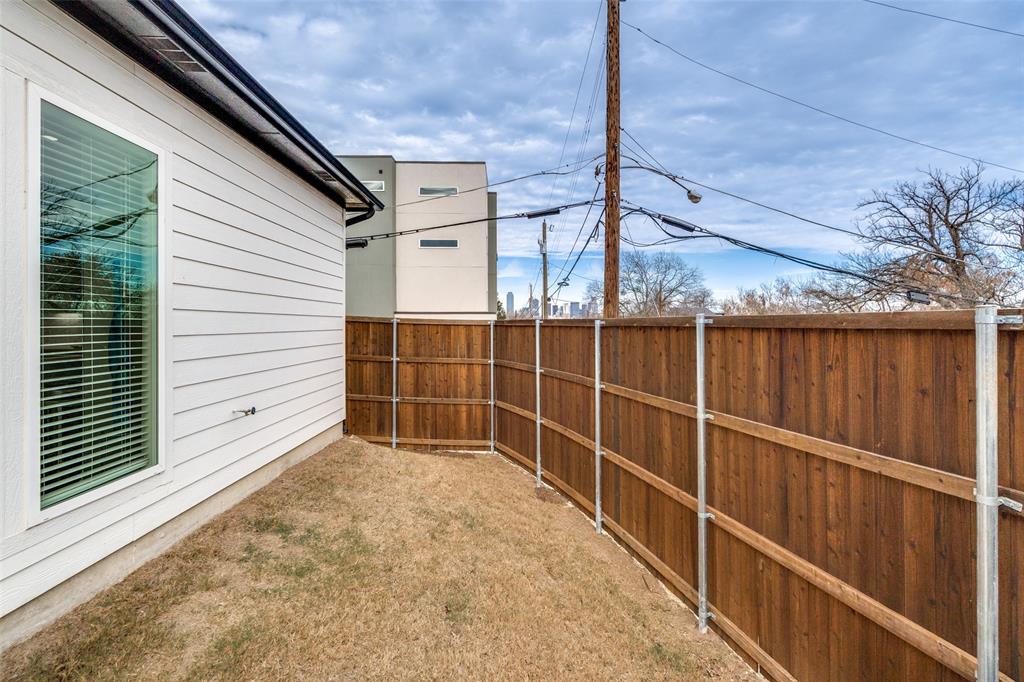 518 Crete Street Dallas, TX 75203 - Photo 25 of 27 View of yard with Dallas skyline in background.