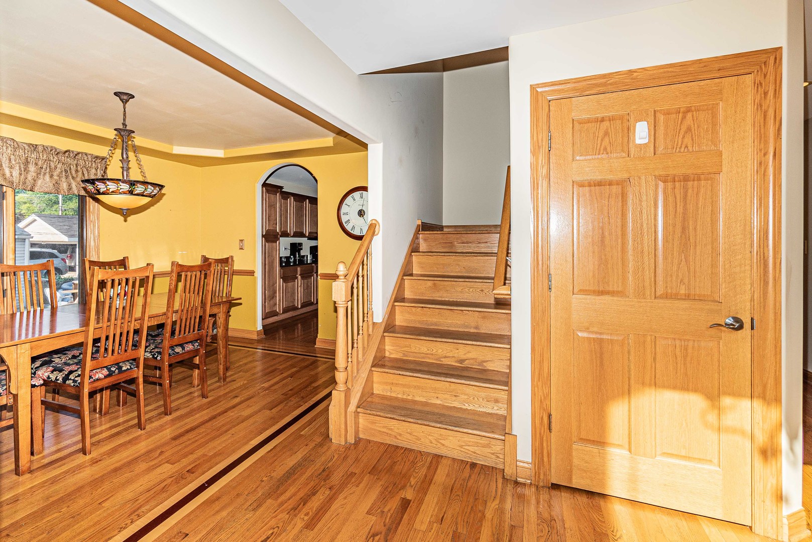 10551 Princess Avenue Chicago Ridge, IL 60415 - Photo 11 of 26 a view of a living room with wooden floor and stairs