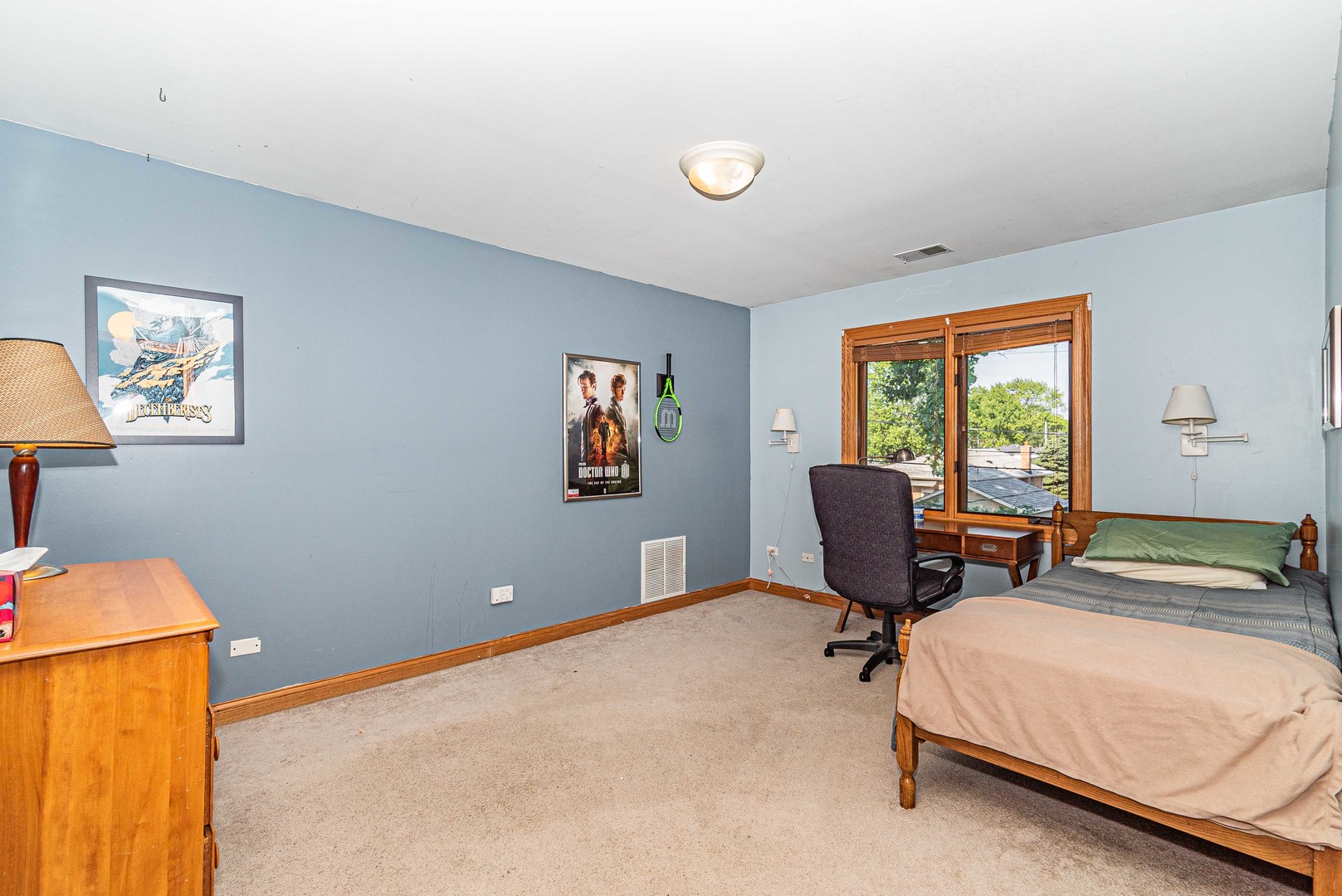 10551 Princess Avenue Chicago Ridge, IL 60415 - Photo 12 of 26 a bedroom with bed and a window