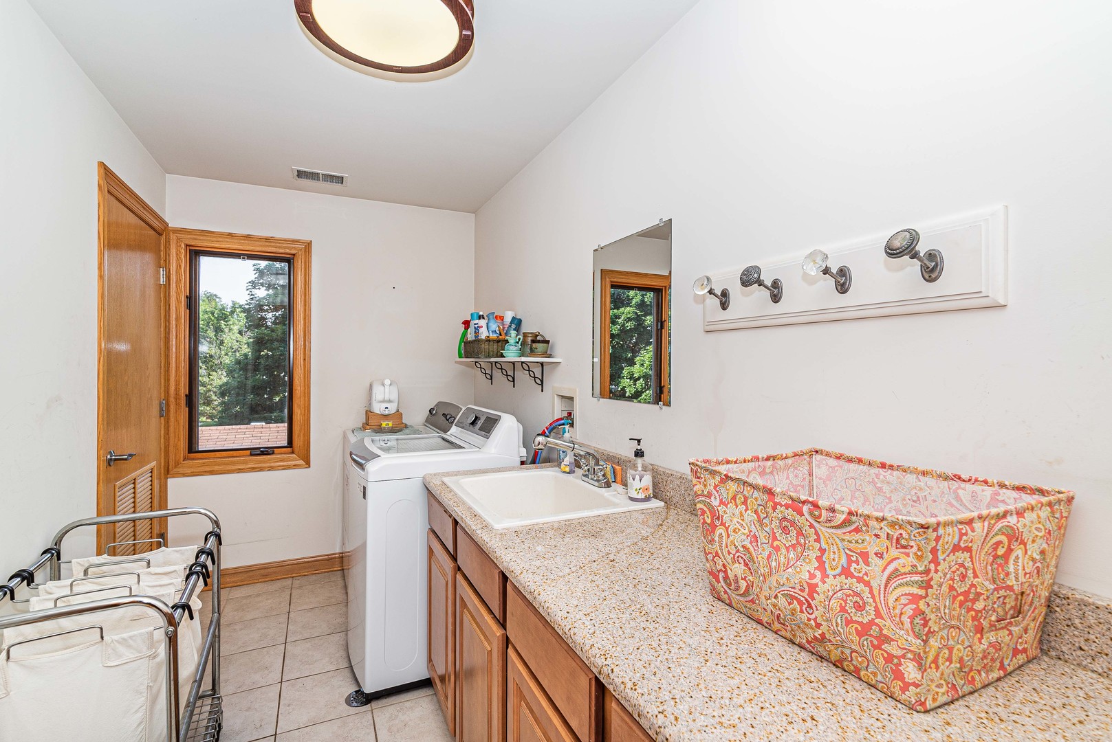 10551 Princess Avenue Chicago Ridge, IL 60415 - Photo 15 of 26 a bathroom with a sink and a mirror