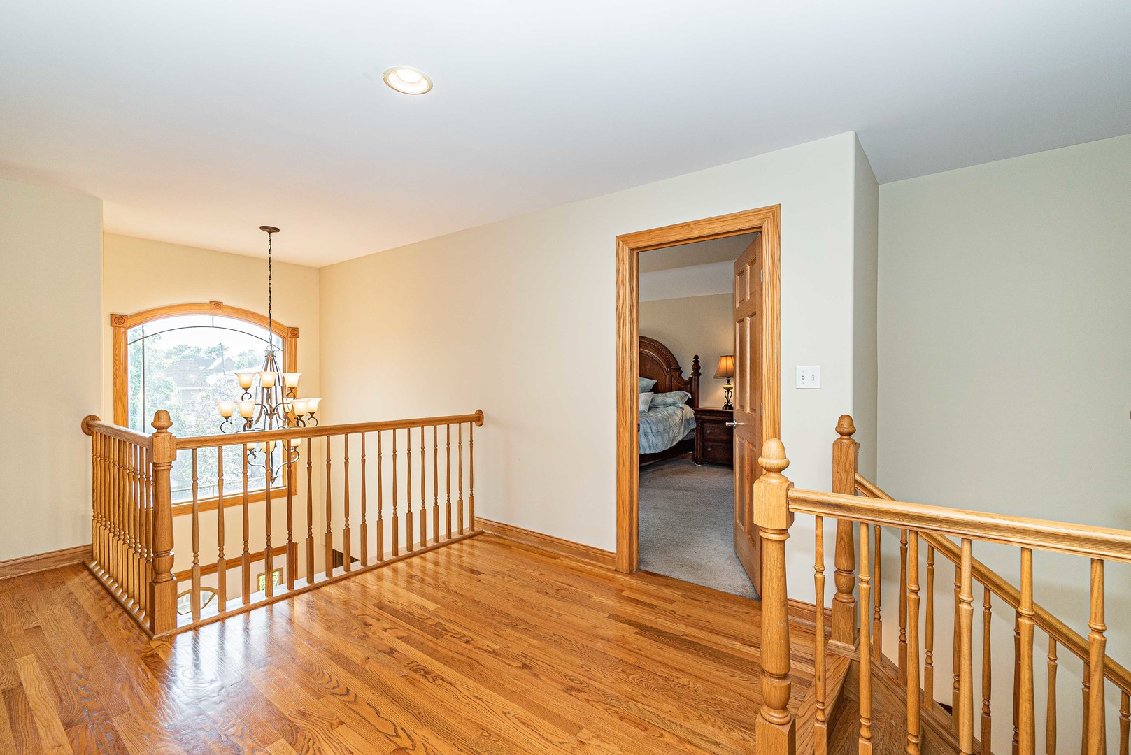 10551 Princess Avenue Chicago Ridge, IL 60415 - Photo 16 of 26 a view of a hallway view with wooden floor and staircase