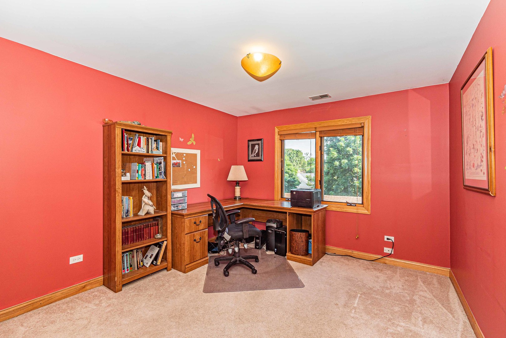 10551 Princess Avenue Chicago Ridge, IL 60415 - Photo 17 of 26 a view of a workspace with furniture and a window