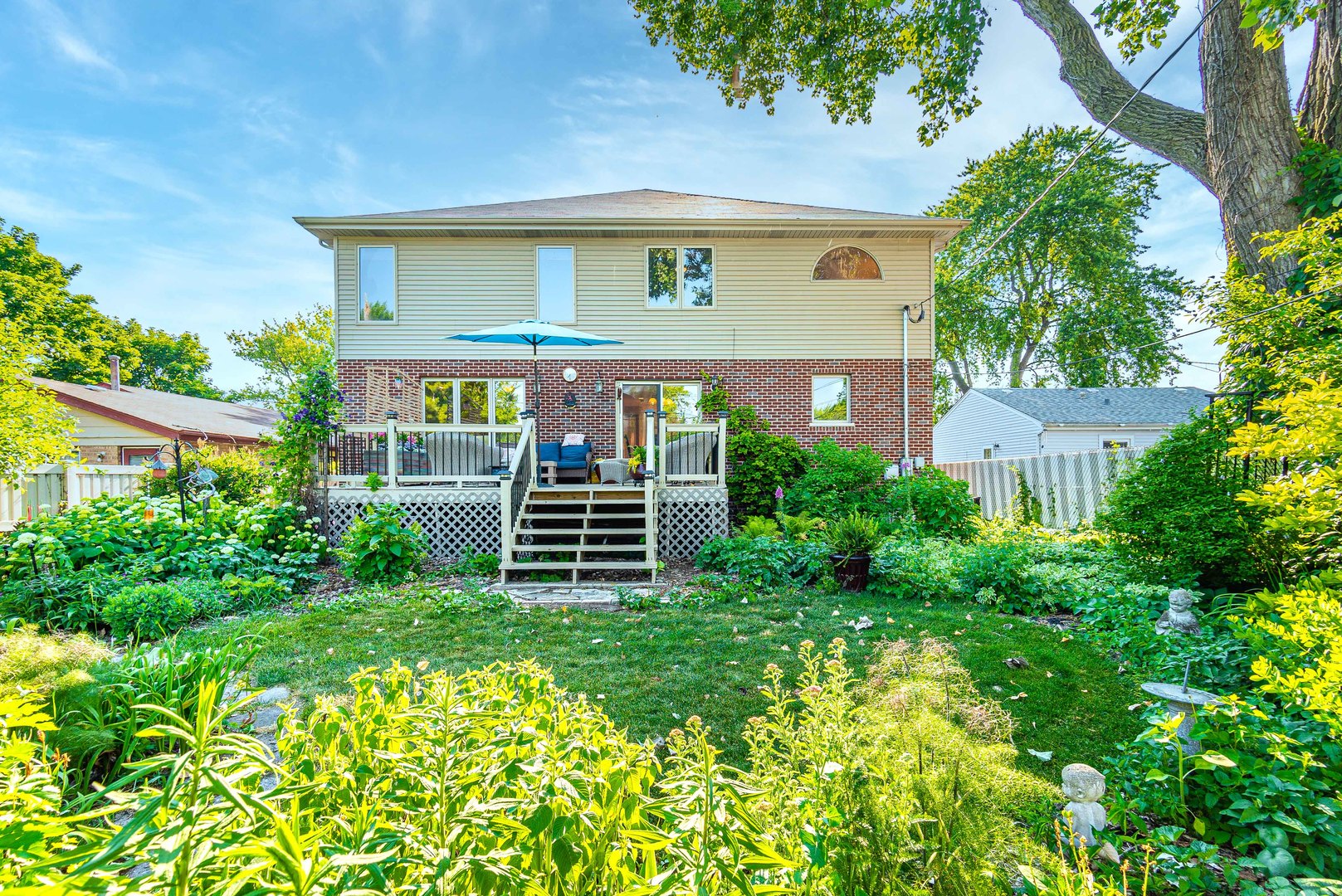 10551 Princess Avenue Chicago Ridge, IL 60415 - Photo 24 of 26 a view of a house with a yard and plants