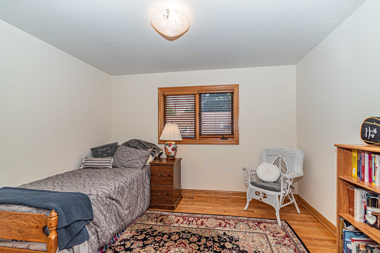 10551 Princess Avenue Chicago Ridge, IL 60415 - Photo 10 of 26 a bedroom with a bed and cabinets