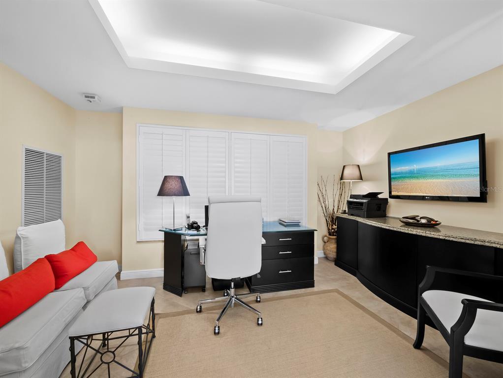 455 Longboat Club Road, Unit 402 Longboat Key, FL 34228 - Photo 26 of 50 a view of a workspace with furniture and a window