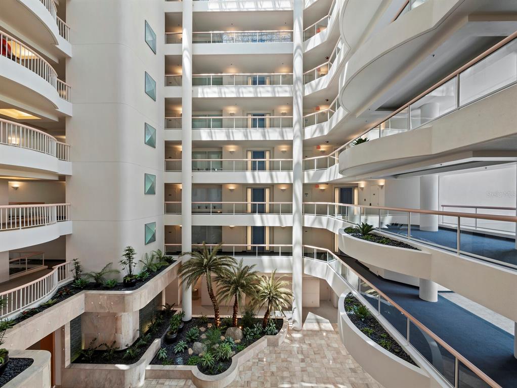 455 Longboat Club Road, Unit 402 Longboat Key, FL 34228 - Photo 29 of 50 a view of a kitchen with a sink and cabinets